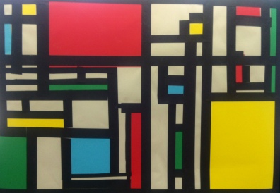 Paper collage styled after modern artist, Mondrian created during our line study unit.