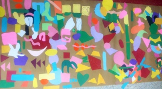 Shape mural collage created by Mrs. Huffman's homeroom.