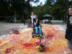 A student and I testing out the large roller that attaches to the front of a wheelchair...
